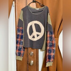 Long sleeve top size medium, but loose fit